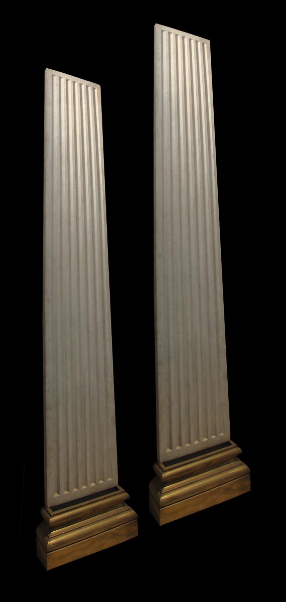 A pair of Italian Carrara marble pilasters with bronze bases. Ca 1900.